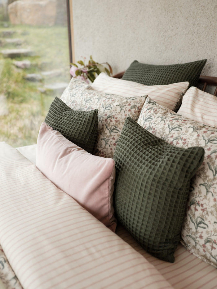 Discover the elegance of our Foxford Olive Green Honeycomb Cushion, a must-have for enhancing your bedroom. Crafted from 100% cotton, it offers the perfect balance of coziness and sophistication. At 65x65cm, it's a versatile choice for staying cozy or adding a touch of vibrancy to your bedding.