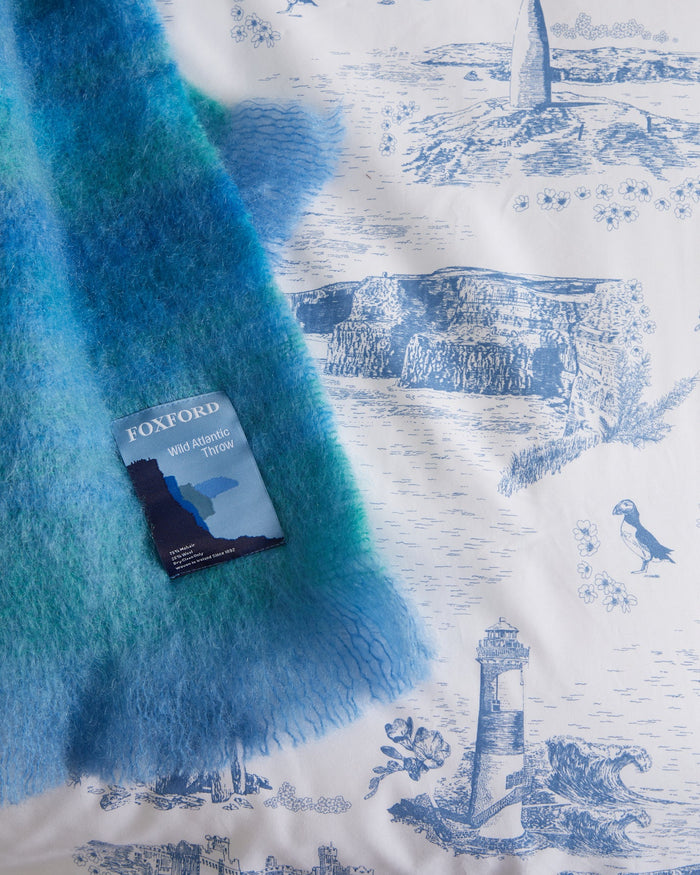 The Foxford Wild Atlantic Duvet Set was designed in collaboration with textile designer Ruth Gallagher. It features hand-drawn illustrations of iconic symbols from the Wild Atlantic Way.