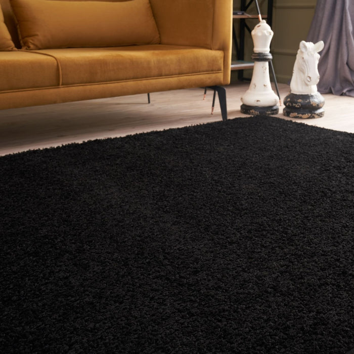 Black shaggy Rug Plain design thick pile, high quality, soft & durable.
