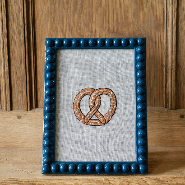 ‘Pretzel'  Framed Embroidery by Edith Cartoonist x Hannah Cummings