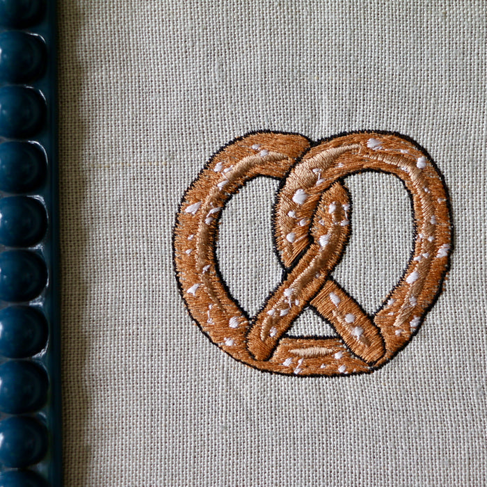 ‘Pretzel'  Framed Embroidery by Edith Cartoonist x Hannah Cummings